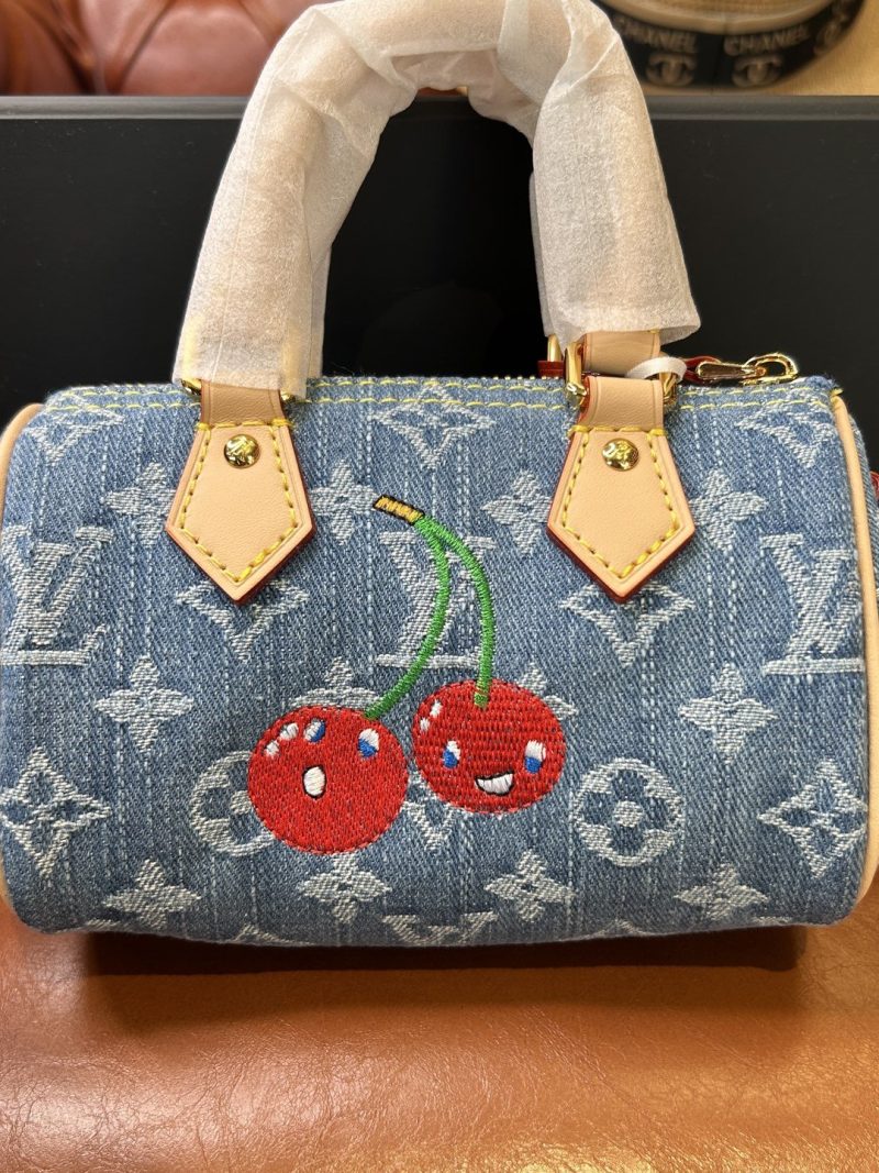 Louis Vuitton Nano Speedy in blue cherry denim — front view