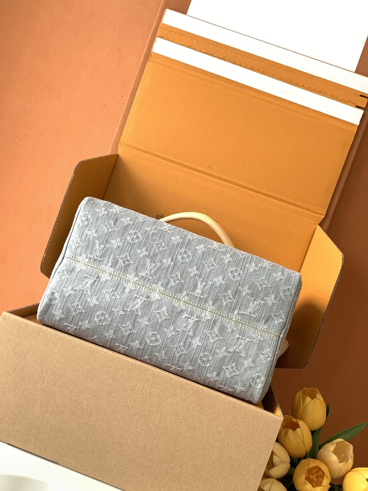 Louis Vuitton Speedy Soft 30 in grey Monogram denim — in box, angled view